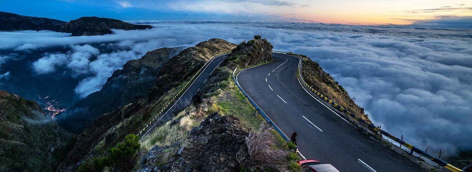 Steep mountain roads in Madeira in the clouds